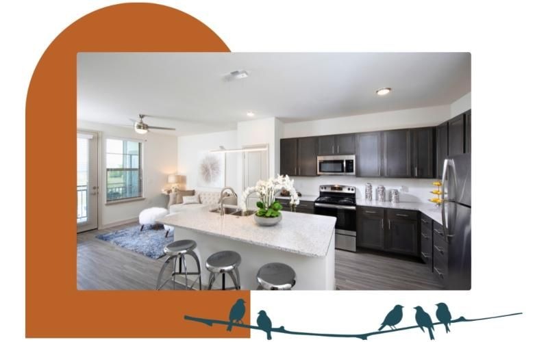 a kitchen with a bar and island